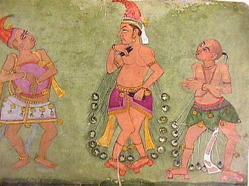 Two male dancers in peacock-feather robes, accompanied by a drummer, , 