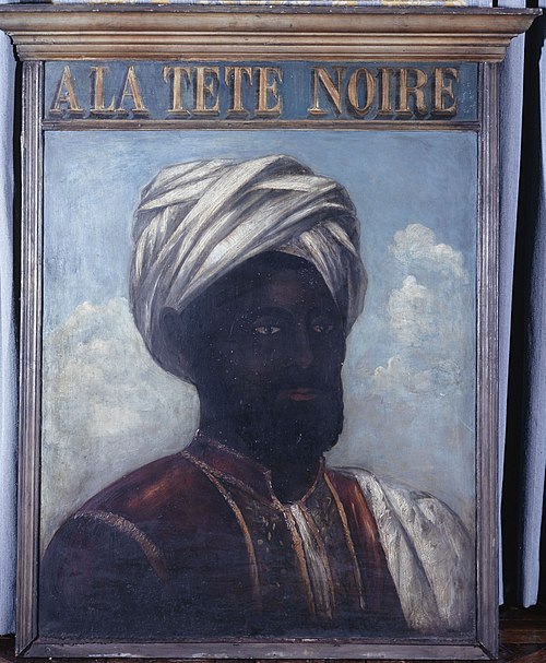 À la tête noire (II). Enseigne de marchand de meubles ou de tapissier. 44, rue du Faubourg Saint-Ant, 1801, 