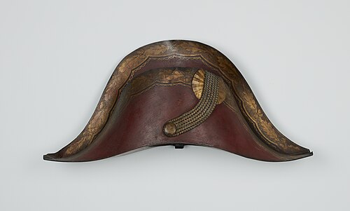 Au chapeau (II). Enseigne de chapelier. Paris, 1701, 