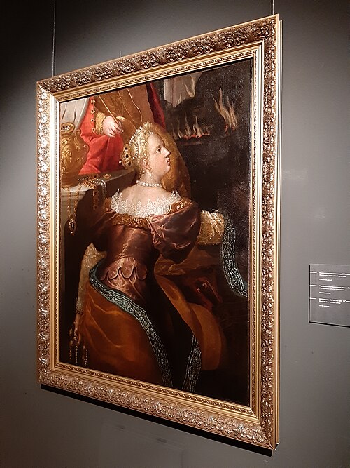 Жанчына ў залацістай сукенцы, 1600, 