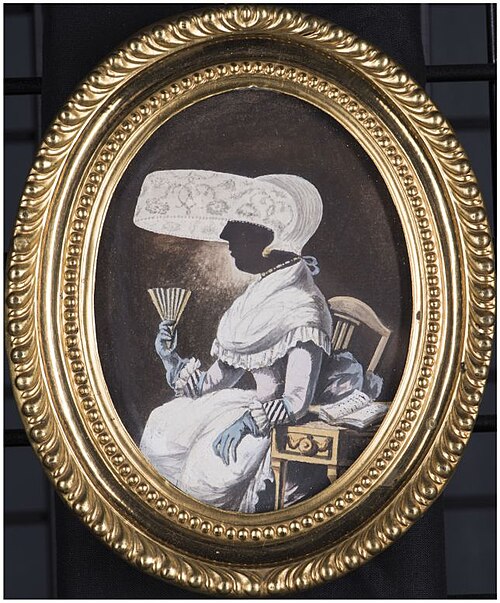 Portret van zittende vrouw met luifelmuts in silhouet, 1800, 