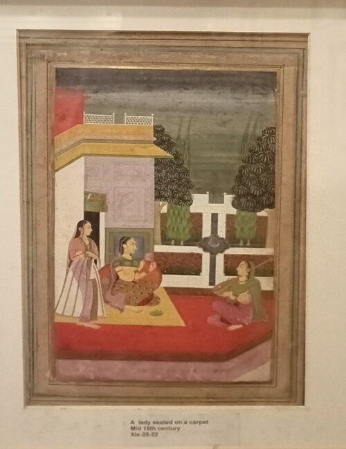 A lady seated on the carpet -Deccani Painting 18th Century, 18, 