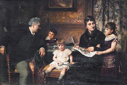 A portrait of a family gathered around a table, 1881, Pierre Jean Van der Ouderaa