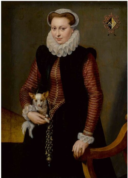Portrait of a young woman, aged 17, holding a small spaniel wearing a collar of bells, , Frans Pourbus l'Ancien