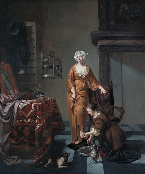 A Lady in an Interior with a Servant washing her Foot, 1699, Johannes Voorhout