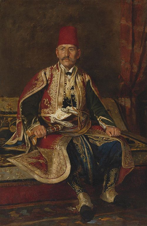 Turkish noble seated in a carpeted interior, , Franz Leo Ruben