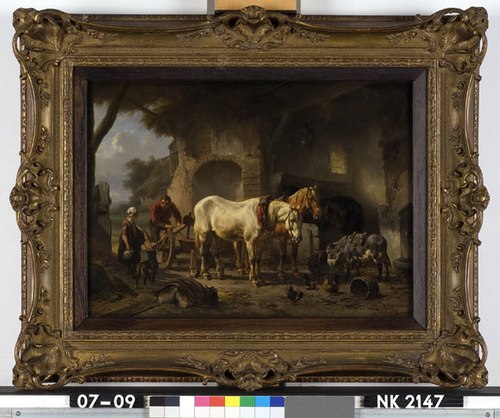Interieur van een stal met boeren, ploegpaarden en een ezel, 1850, Wouterus Verschuur