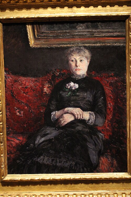 Woman Seated on a Red-Flowered Sofa, 1882, Gustave Caillebotte