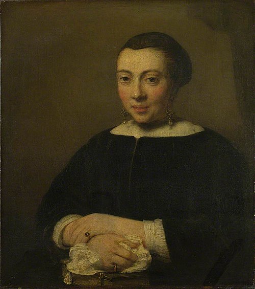 Portrait of a Young Woman with her Hands Folded on a Book, 1654, Willem Drost