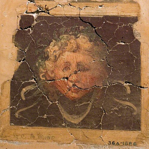 Female Head Framed by a Pattern of Ribbons (fragment of a wall decoration), , Giovanni da Udine